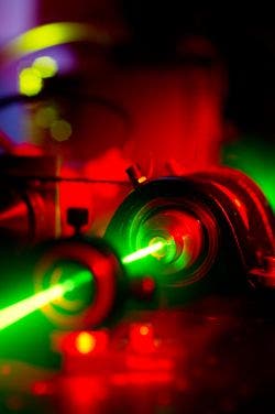 The green laser is shown as it leaves the ruby crystal. (c) University of Glasgow