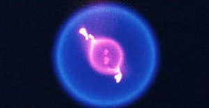 Color image of a fuel droplet burning in space during NASA's Flame Extinguishment Experiment aboard the International Space Station. (c) NASA