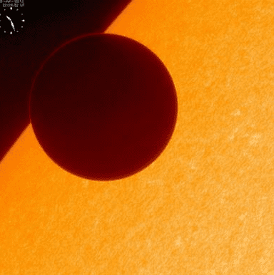 Venus moves to pass across the sun, in this image captured by Japan's Hinode satellite on June 6, 2012. (c) REUTERS/JAXA/Handout