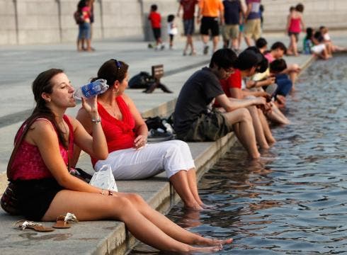 If you thought this summer is preposterously hot, wait until you get to sample what next year has to offer. (c) Yuri Gripas; AFP/Getty Images