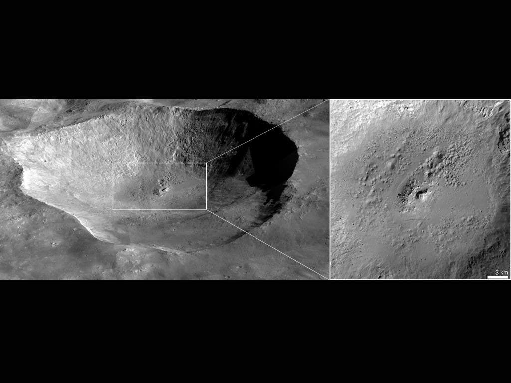 This perspective view of Marcia crater on the giant asteroid Vesta shows the most spectacularly preserved example of 