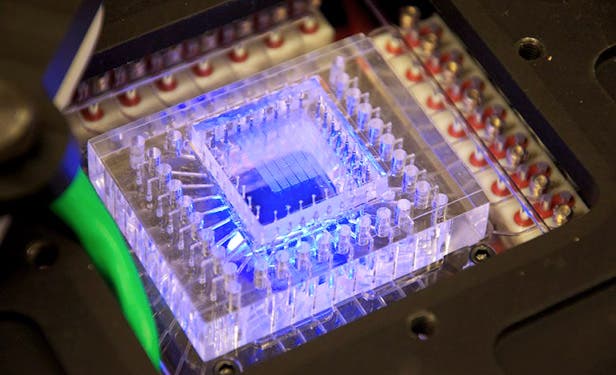 A micro-fluidic device developed at MIT designed to automatically run DNA experiments on other planets. Credit: Christopher Carr | MIT