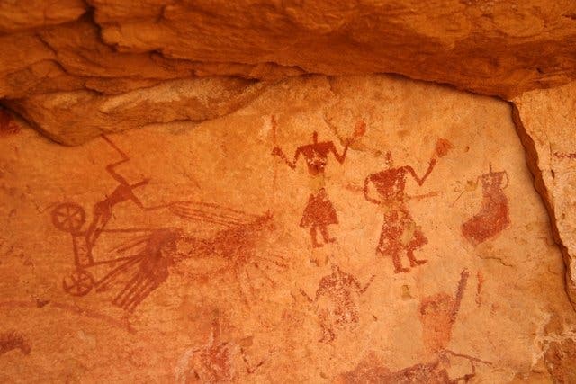 A cave painting in Jebel Acacus, modern day Lybia. Along with many other, this painting is 12 000 years and is among some of the best works found anywhere else in the world. source