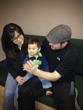 Baby Leif (centre, pictured with parents Harumi Inokoshi and Eric Roe) is growing up bilingual, hearing Japanese from his mother and English from his father. (Photo: Janet Werker, UBC Infant Studies Centre)