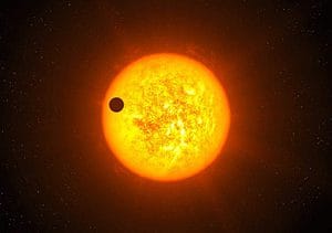 Illustration of a exoplanet transiting its parent star in the observational plane. (C) scienceoffice.org 