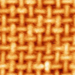 This scanning tunnelling microscopy image shows how iron atoms and organic molecules become ordered in patterns on a gold substrate. (c) Nature Comm