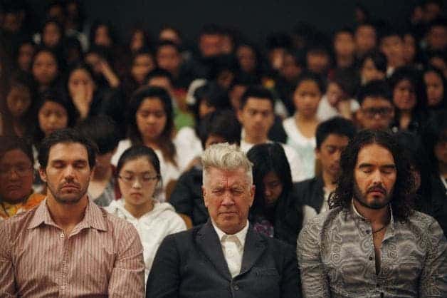 Barry Zito, David Lynch, Russell Brand meditate with students during Quiet Time at Burton High. Photo: Lea Suzuki, The Chronicle