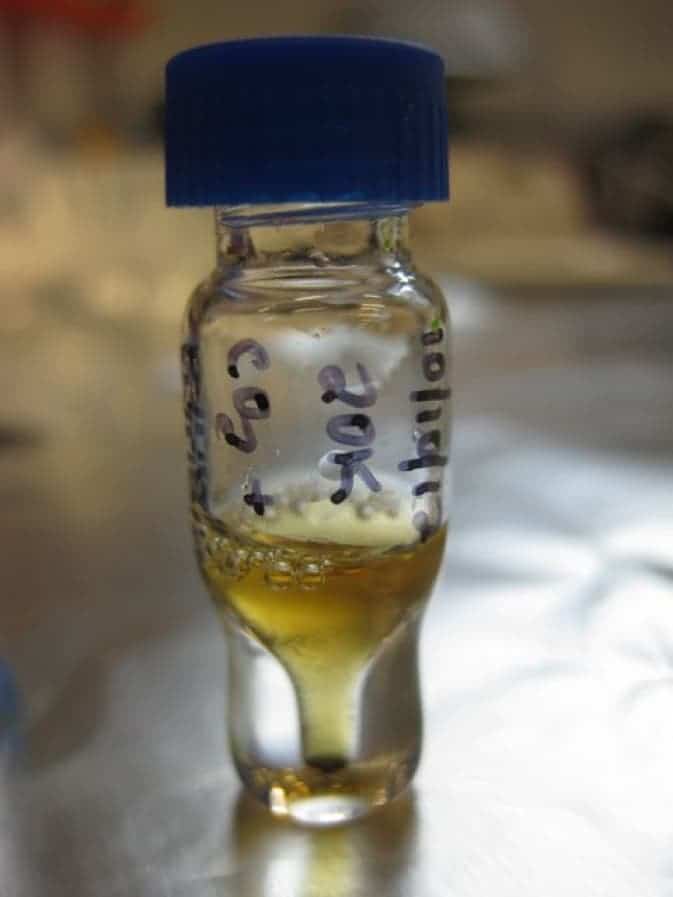 Residue from a laboratory experiment simulating the conditions of interstellar space. The residue contained vitamin B3 (and related compounds) and may help explain meteorite chemistry. Image Credit: Karen Smith