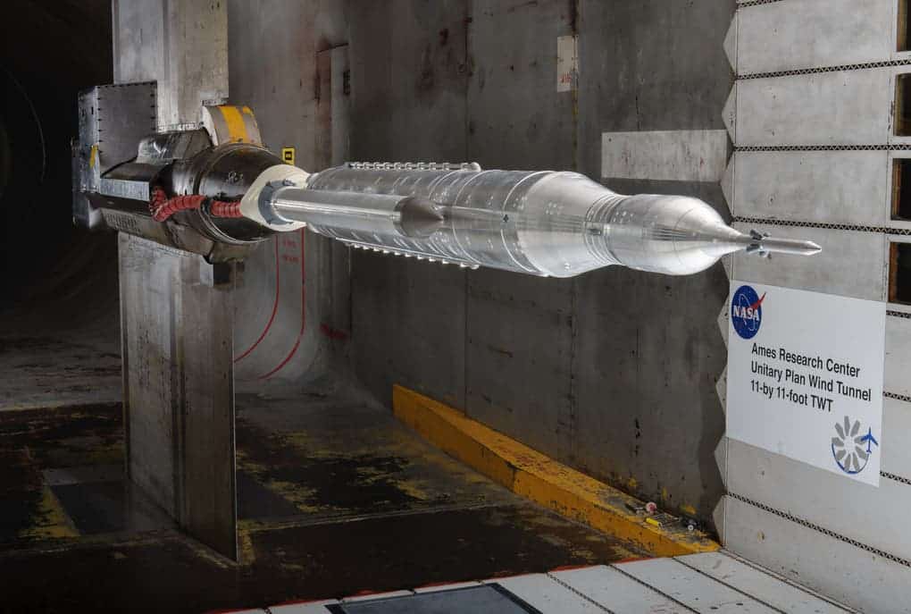 A small, scale model of the SLS in a wind tunnel at the Ames Research Center in Mountain View, California, in November 2013. (Credit: NASA/ARC/Dominic Hart)