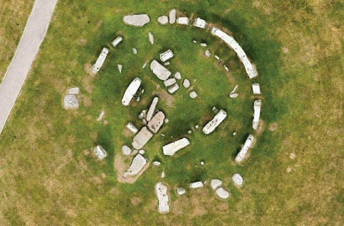 This aerial photograph shows patchmarks whose position suggest there were once laid stones there. Photo: English Heritage