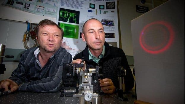 Drs Shvedov (L) and Hnatovsky used a doughnut-shaped laser beam to push and pull small glass spheres