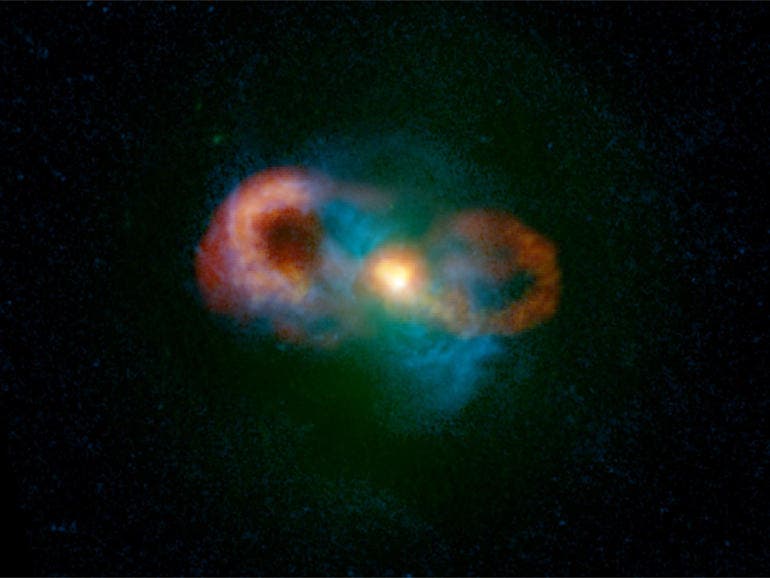 The teacup galaxy. Red/yellow shows the radio emission 
