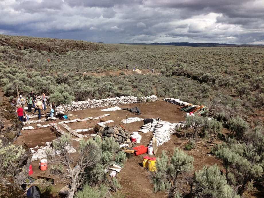 This June 6, 2013 photo provided by the University of Oregon Museum of Natural and Cultural History shows the Rimrock Draw Rockshelter archaelogical dig outside Riley, Ore. It is here that they found the tool now, in 2015.