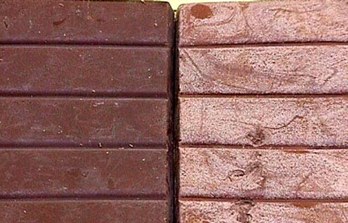 Chocolate bloom (right) is harmless, but most customers would simply reject it. Image via Wikipedia.