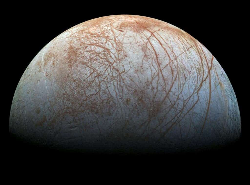 Realistic-color Galileo mosaic of Europa, highlighting the mysterious lines. Image via Wikipedia.