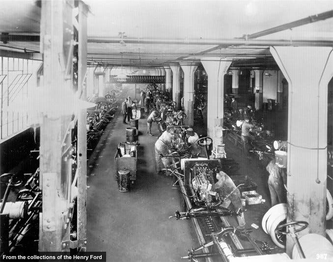 Chassis construction was the final step in Ford’s transition from static to moving assembly. This 1914 photo shows in-progress chassis on the line. The moving lines cut the Model T's final assembly time in half, from 12 hours to six. Continual adjustments and refinements kept reducing final assembly time until nearly four more hours were saved.