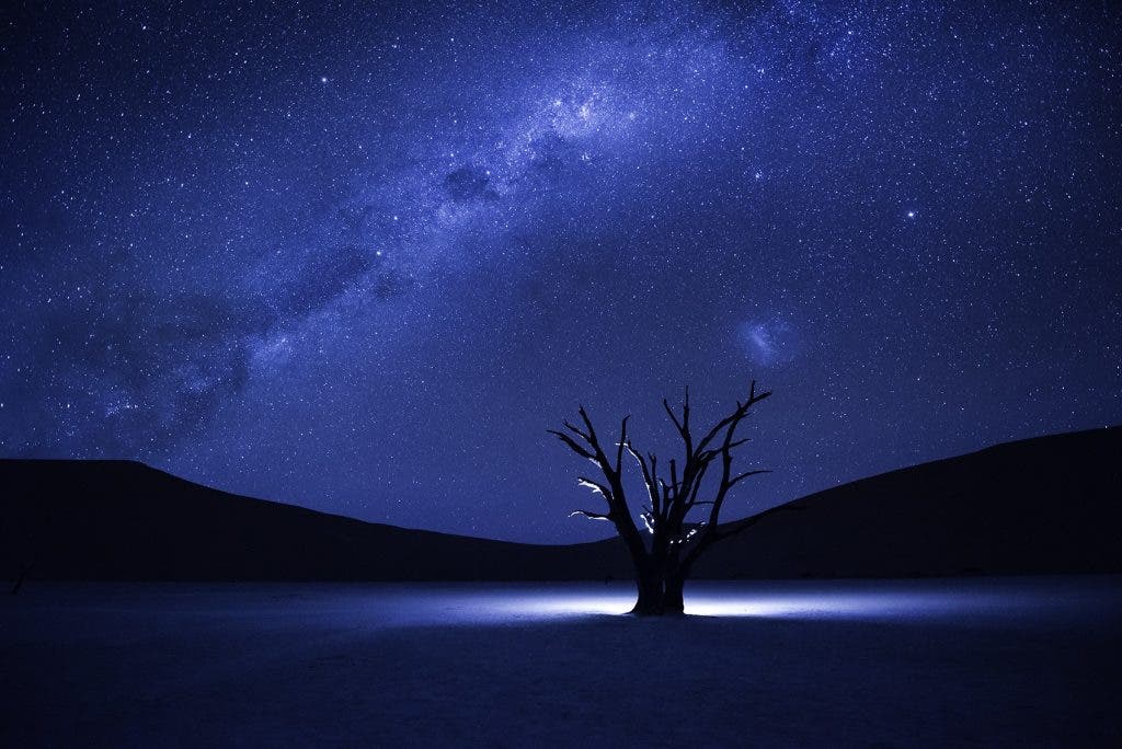 Photo and caption by Christopher R Gray /National Geographic Traveler Photo ContestI visited Deadvlei in 2008. The personal emotional and spiritual connection I felt with "The Beginning" I know I had to return someday.  That time came in May of 2015.  I knew I had to make a photograph that reflected how I felt during my first visit and on this visit.  I did capture it.  I fell it was not just a sense of place but a sense of time.