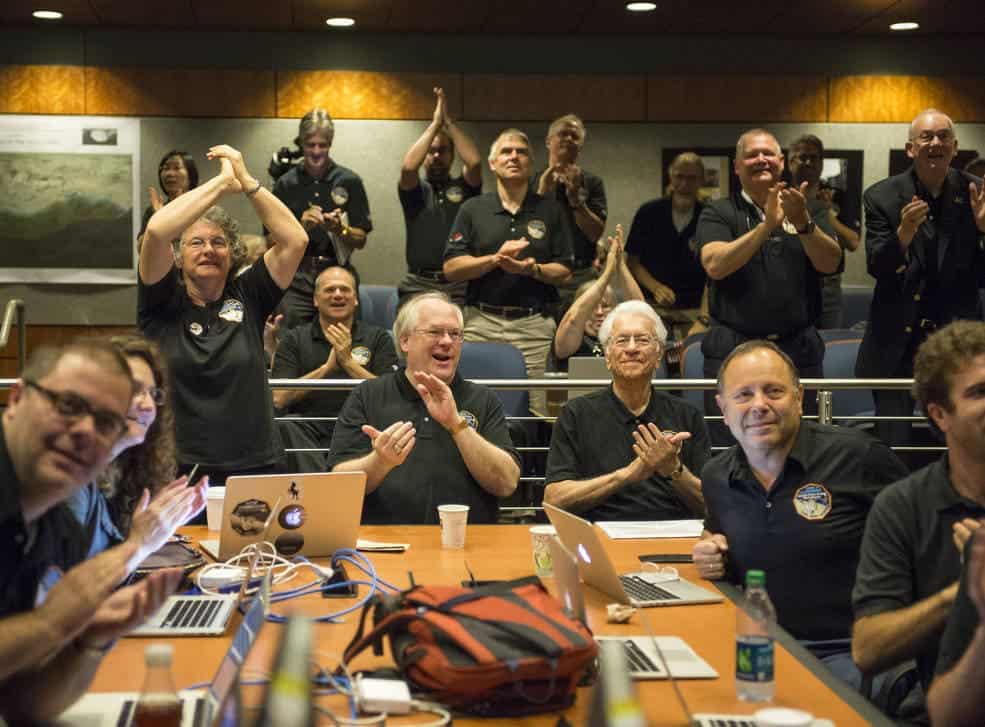 Members of the New Horizons science team react to seeing the spacecraft's last and sharpest image of Pluto before closest approach later in the day, Tuesday, July 14, 2015 at the Johns Hopkins University Applied Physics Laboratory in Laurel, Maryland.
Credits: NASA/Bill Ingalls