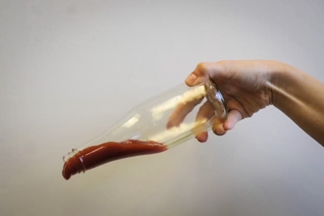 Ketchup slides out of a bottle that's been coated with LiquiGlide.

Courtesy of the Varanasi Research Group