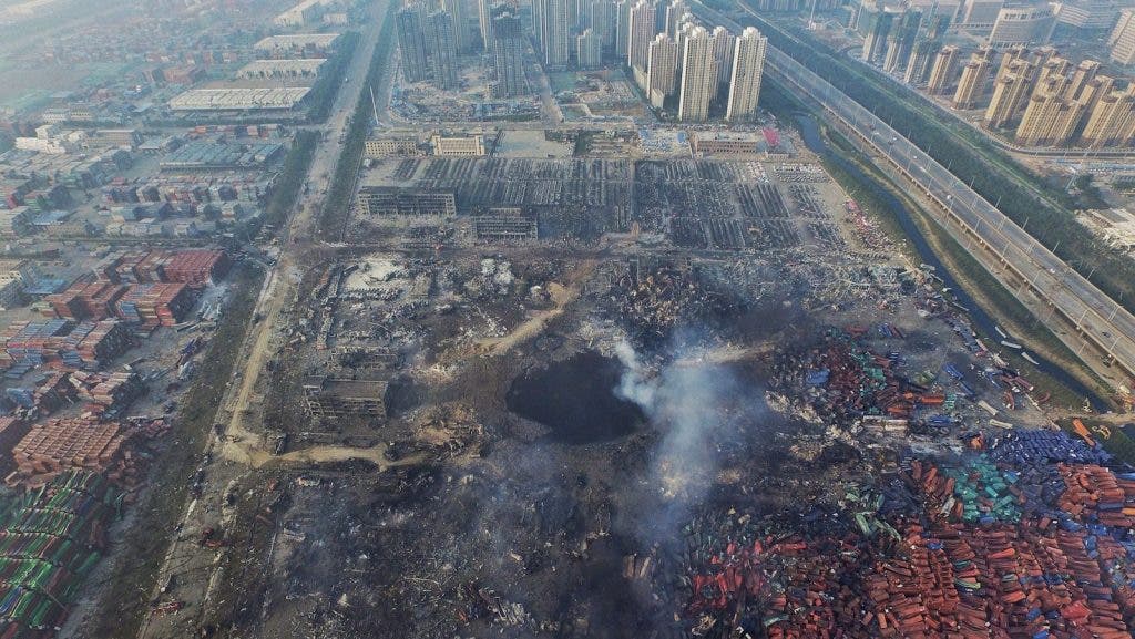 The huge crater left in the wake of the explosion in Tianjin, China.(EPA)