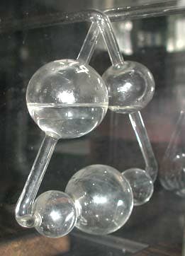 The delicate piece of glassware to the left is more that 150 years old, the last example of a Kaliapparat to survive from Liebig's laboratory. It is displayed in the Liebig Museum in Giessen, which is reasonably called the "Birthplace of Modern Organic Chemistry", because it is where Liebig taught from 1824 until 1852.