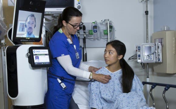  RP-VITA stands for Remote Presence Virtual Independent Telemedicine Assistant. The system has an iPad interface that allows the doctor to communicate with staff and patients. 