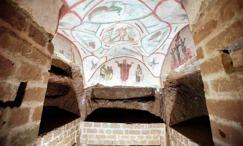 A fresco in the restored Catacombs of Priscilla, Rome. Part of a separate labyrinth of Roman tombs has been damaged by illegal dumping.
Image via theguardian