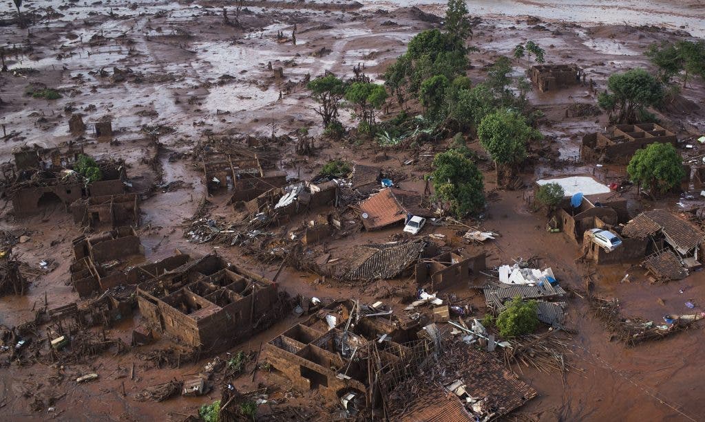 Homes lay in ruins after two dams burst, flooding the small town of Bento Rodrigues in Minas Gerais state, Brazil. Photograph: Felipe Dana/AP