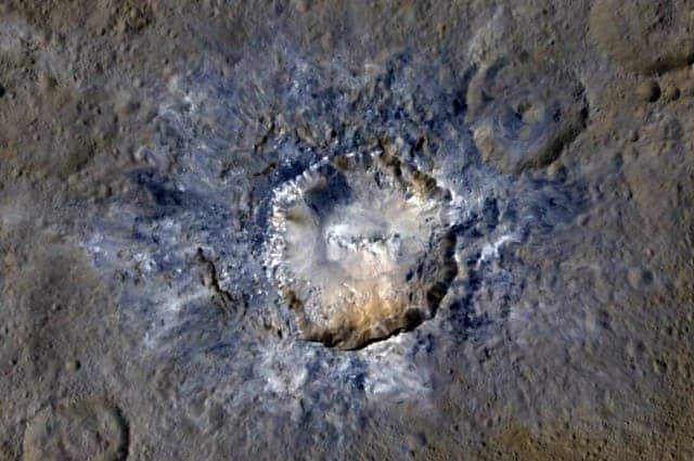 A false-color image of Haulani Crater shows evidence of recent landslides. NASA/JPL-Caltech/UCLA/MPS/DLR/IDA