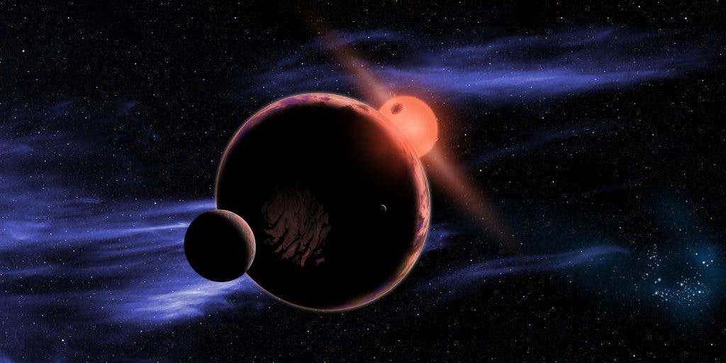 An artist's impression of a planet with two exomoons orbiting in the habitable zone of a red dwarf. Credit: NASA // Wikimedia Commons