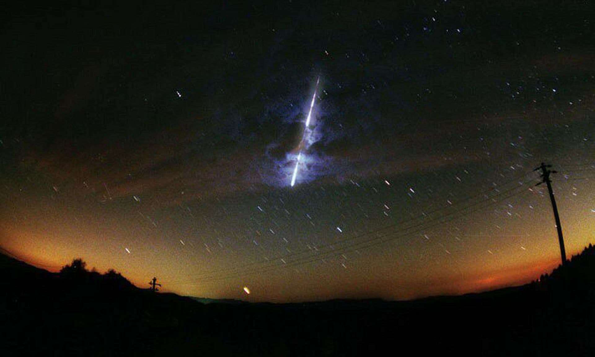 A Nasa image showing a meteor streaking across the sky in the United States.
Image credits NASA / EPA.