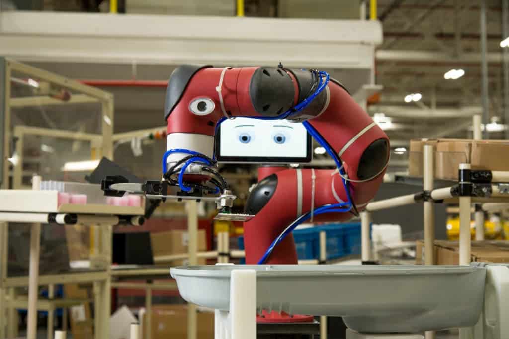 Sawyer attentively working on a General Electric assembly work station. Credit: Rethink Rebotics