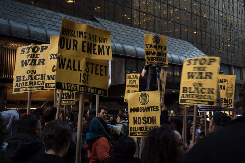 Protestors in New York. Image credits: MAL3K / Flickr.