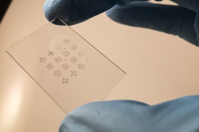 MIT researchers have fabricated a stamp made from forests of carbon nanotubes that is able to print electronic inks onto rigid and flexible surfaces. Image credits: Sanha Kim and Dhanushkodi Mariappan