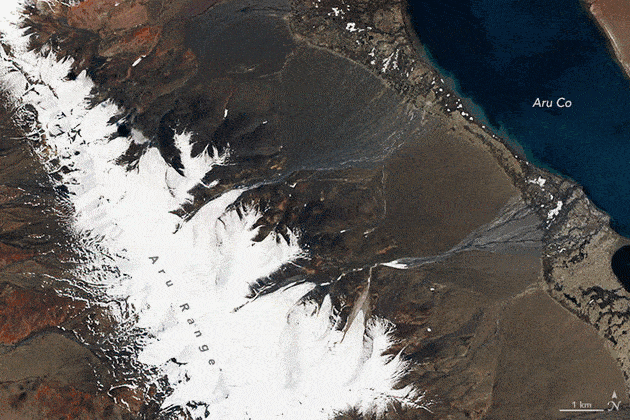 NASA satellite imagery shows what the Aru range looked like before and after a glacier collapsed. Credit: NASA