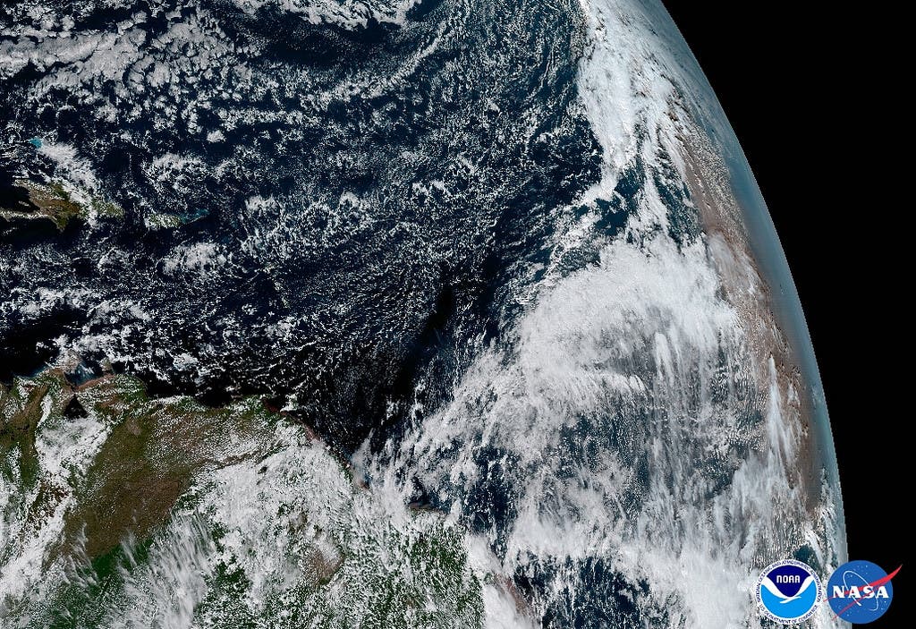 The Saharan Dust Layer can be discerned in the far right edge of this image of Earth. This dry air from the coast of Africa can have impacts on tropical cyclone intensity and formation. GOES-16’s ability to observe this phenomenon with its 16 spectral channels will enable forecasters to study related hurricane intensification as storms approach North America. Credit: NOAA, NASA