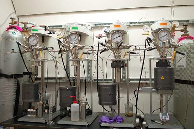 Catalytic conversion of biomass-derived chemicals to renewable polymers occurs in laboratory stirred-tank reactors. Credit: University of Minnesota. 