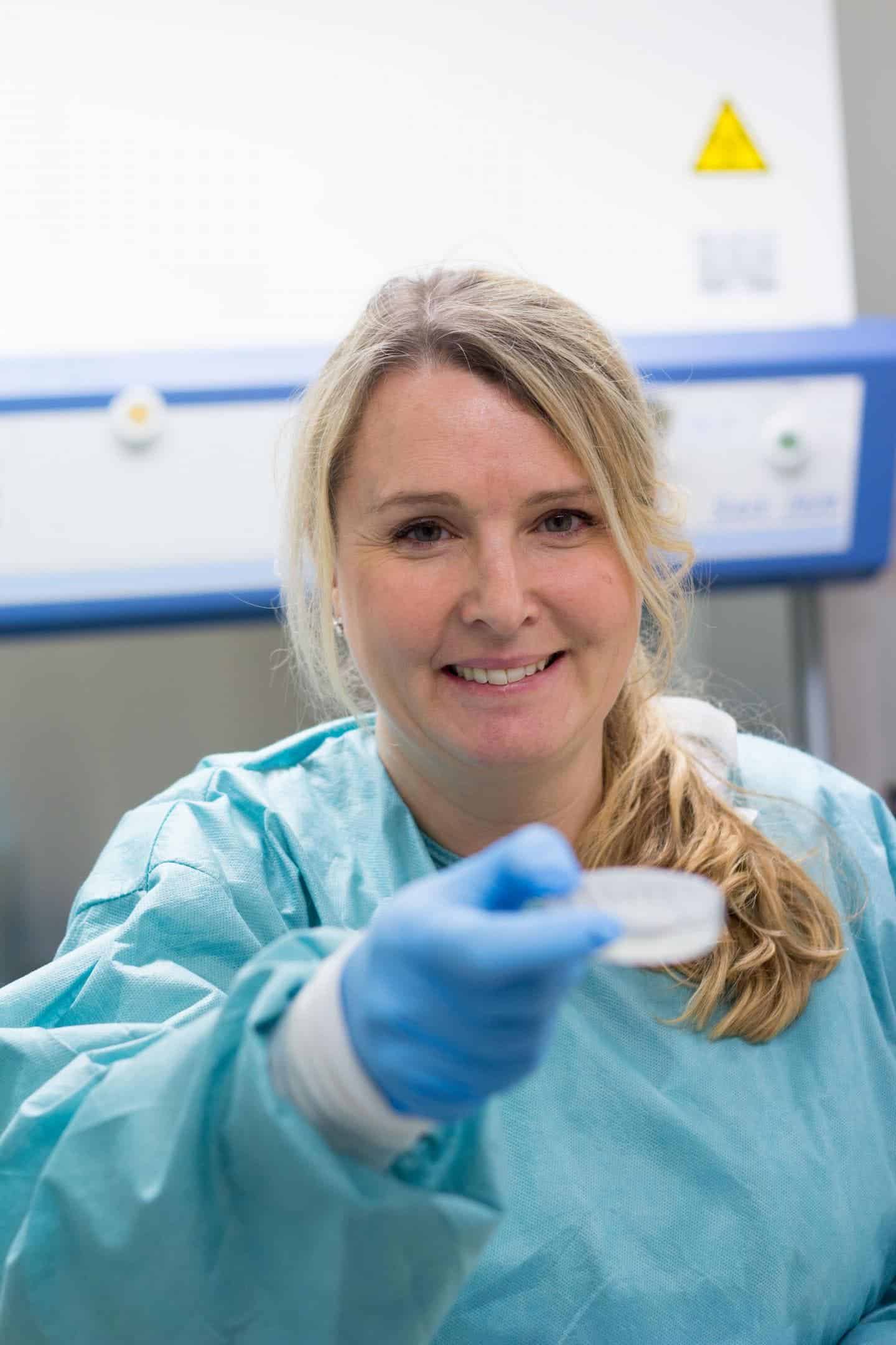 The lead researcher, Stina Simonsson, holding some 3D-printer cartilage. Image credits: Elin Lindström Claessen.