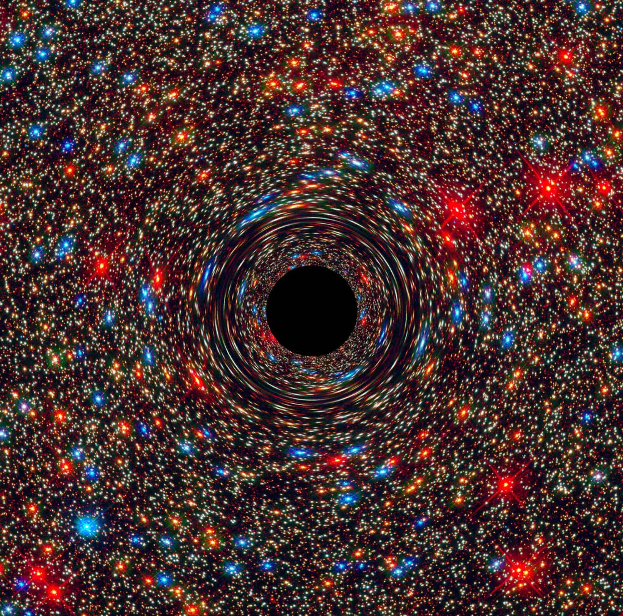 Computer generated image of what a black hole might look like. The very edge is known as the event horizon. Credit: NASA