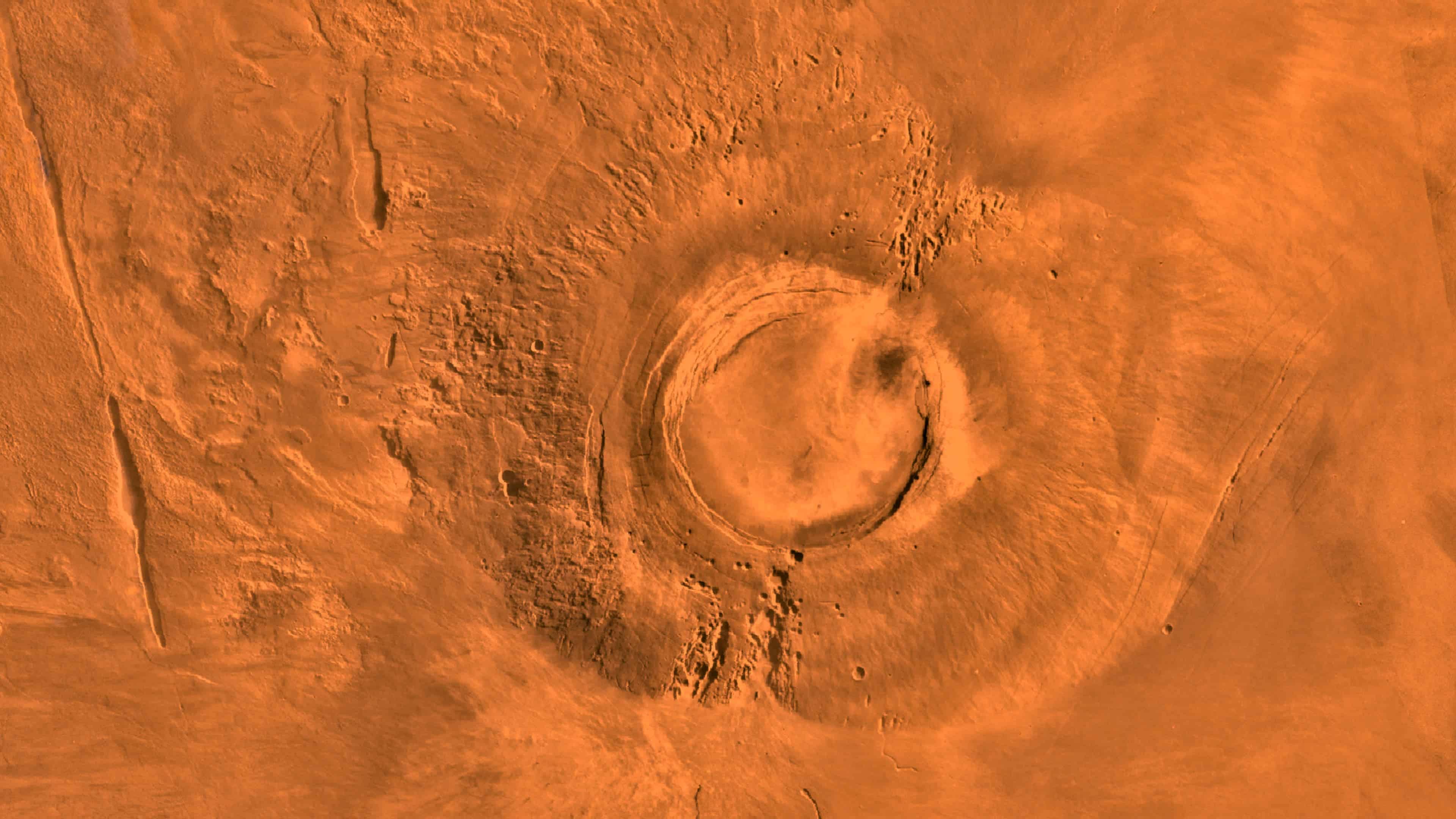 A digital-image mosaic of Mars' Tharsis plateau showing Arsia Mons.
Image credits  NASA / JPL.