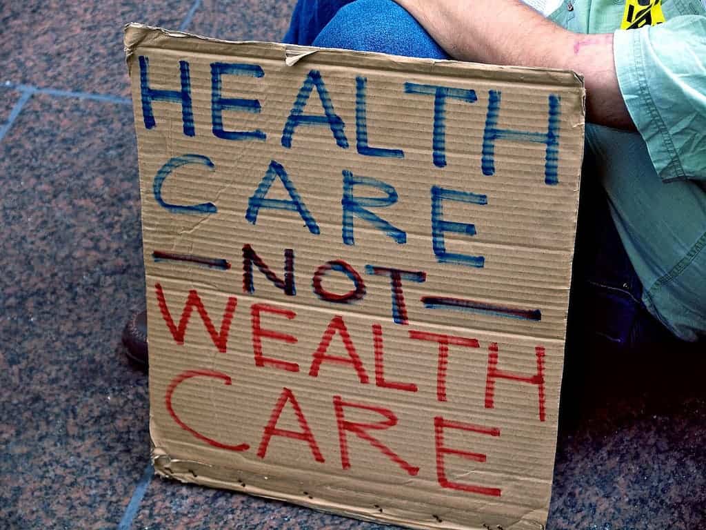 Healthcare not wealthcare sign.
