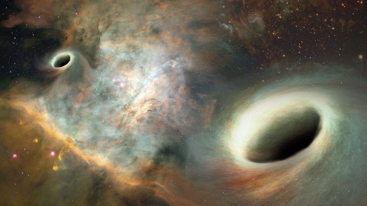 Artist impression of two supermassive black holes orbiting a common center of mass. Credit: Josh Valenzuela/UNM