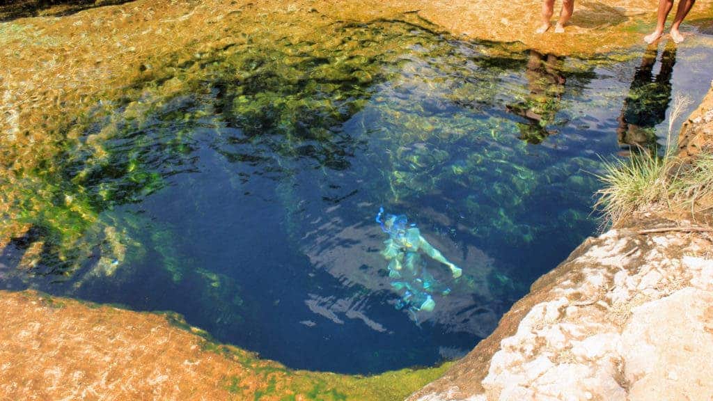 Jacob's Well is only 13 feet wide at the opening. Credit: Wikimedia Commons.