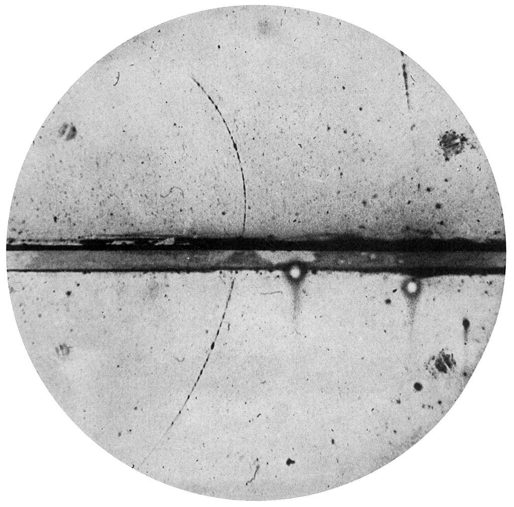 Cloud chamber photograph of the first positron ever observed. Credits: Carl D. Anderson.
