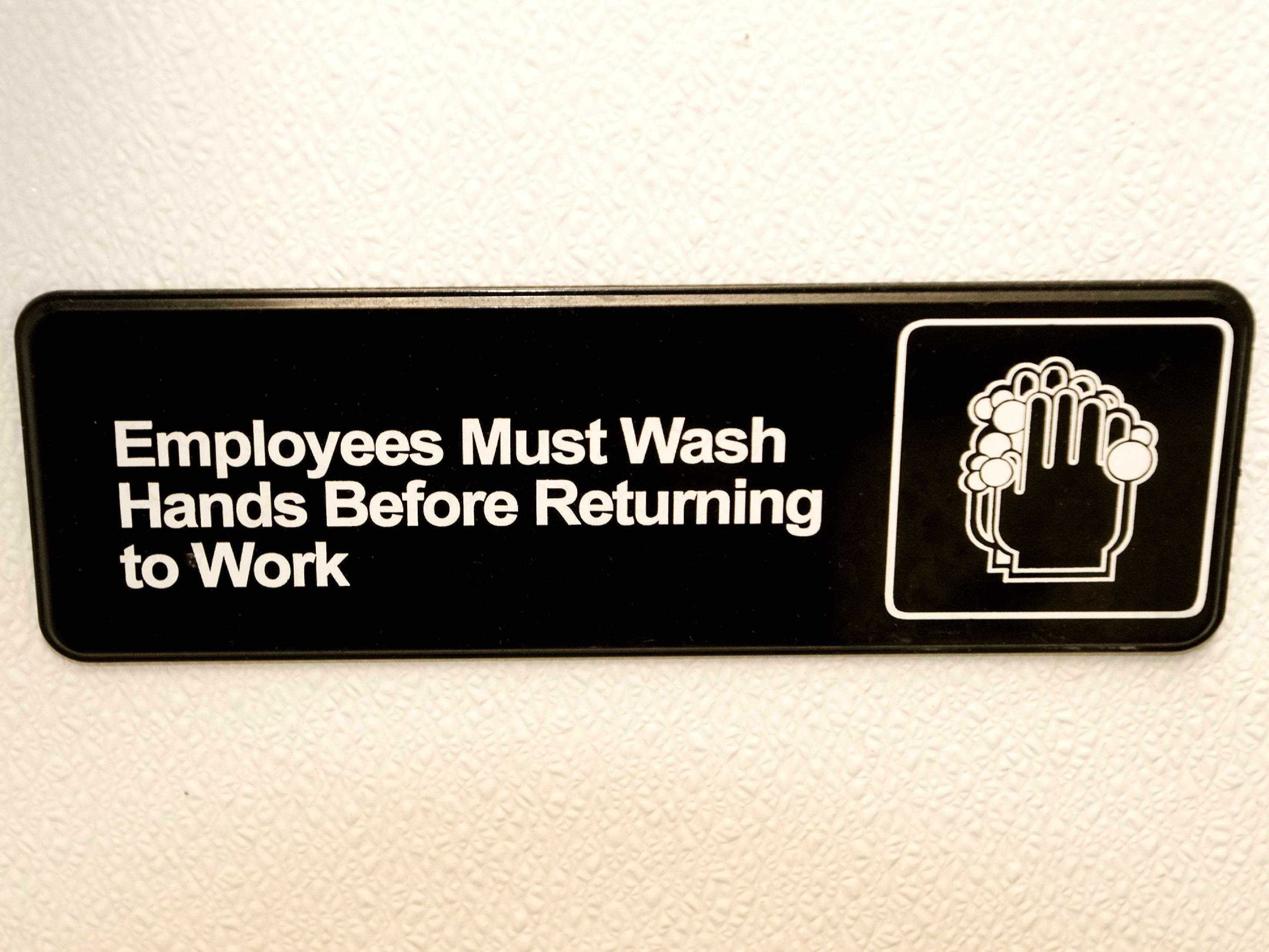 Wash hands sign.