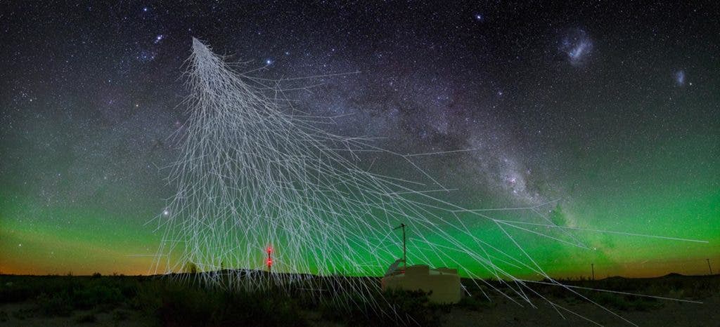 This is an artist's rendering of a cosmic-ray air shower with a water-Cherenkov detector of the Pierre Auger Observatory in western Argentina. Credit: A. Chantelauze, S. Staffi, L. Bret.