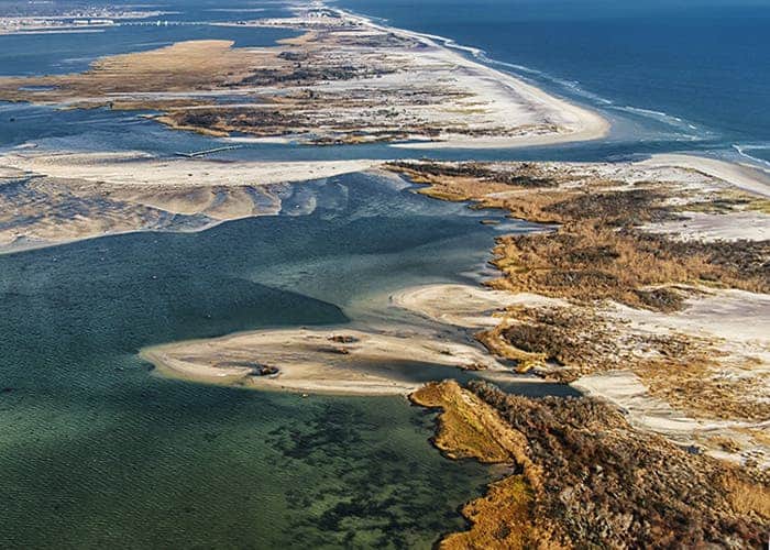A breach on Fire Island was created by Hurricane Sandy in October 2012, illustrating the dynamic nature of this barrier island and its vulnerability to sea level rise. Image credits: NPS Photo/Abell.