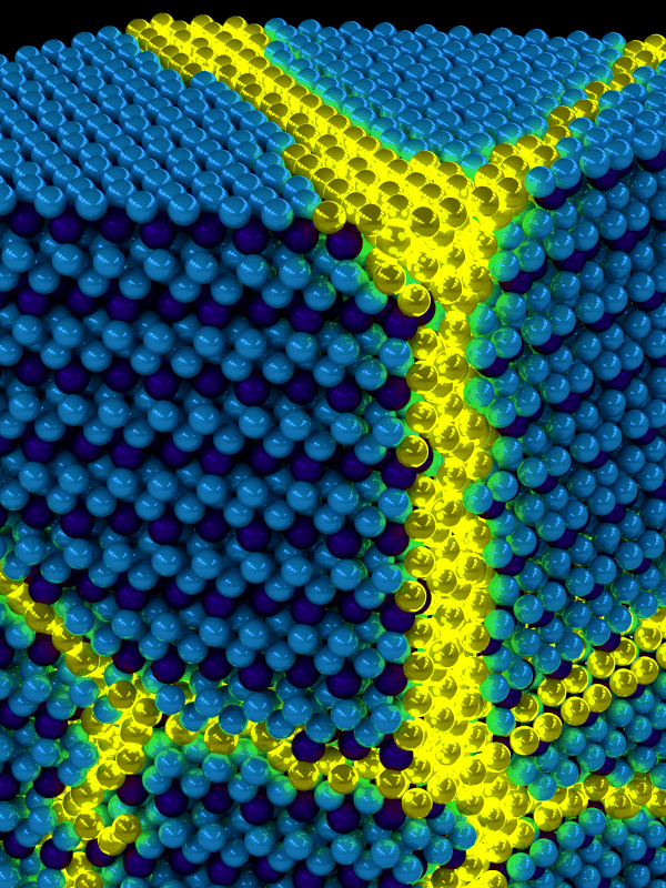 Artist's depiction of the collective excitons of an excitonic solid. These excitations can be thought of as propagating domain walls (yellow) in an otherwise ordered solid exciton background (blue). Image courtesy of Peter Abbamonte, U. of I. Department of Physics and Frederick Seitz Materials Research Laboratory.