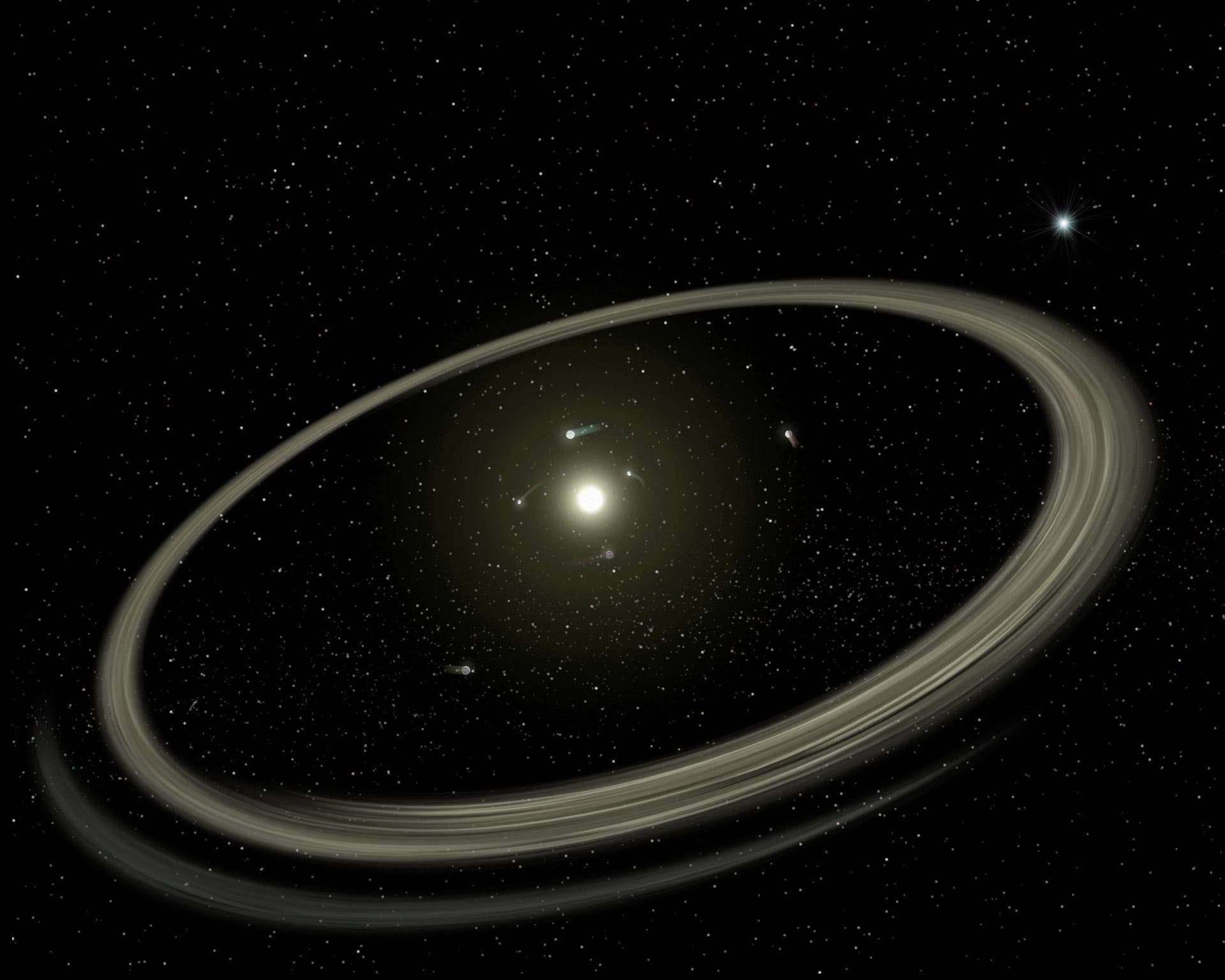Illustration of a planetary system surrounded by a debris disk. Credit: NASA