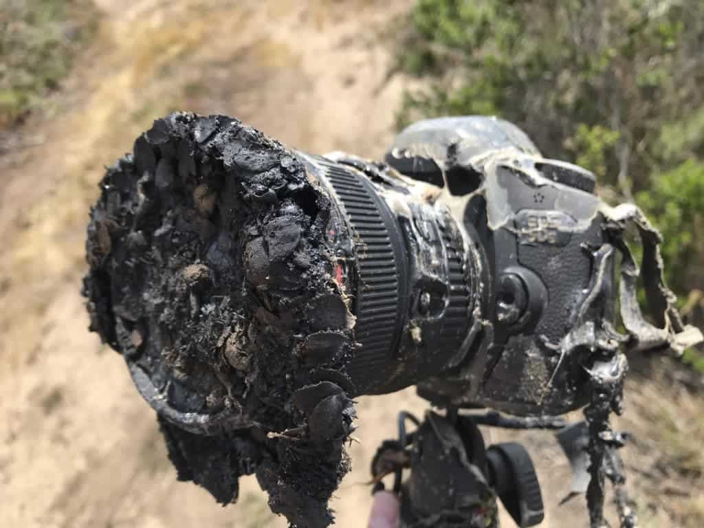 NASA Photographer Bill Ingalls's camera after it was caught in brushfire caused by the launch of the NASA/German GRACE-FO from Vandenberg Air Force Base on May 22, 2018. Credits: NASA/Bill Ingalls.